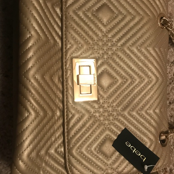 Brand new with Tags Bebe gold purse - Picture 6 of 6